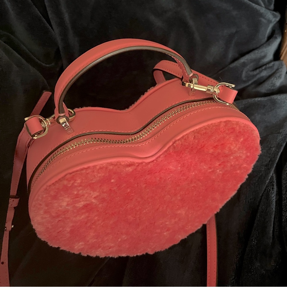 Kate Spade heart-shaped crossbody. Strap is detachable.